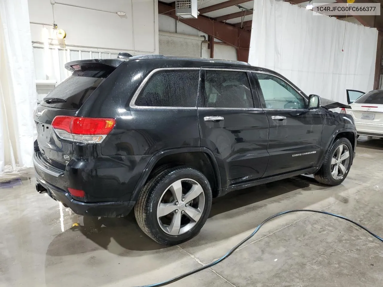 2015 Jeep Grand Cherokee Overland VIN: 1C4RJFCG0FC666377 Lot: 58490804