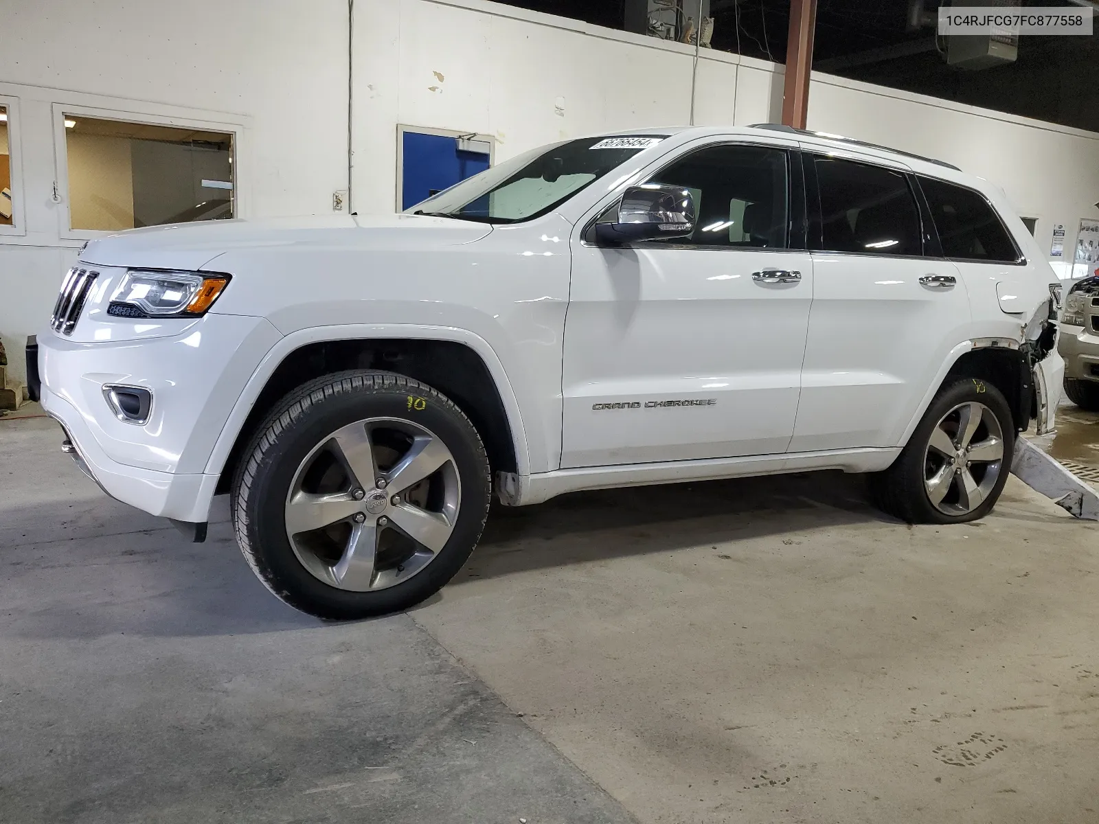 2015 Jeep Grand Cherokee Overland VIN: 1C4RJFCG7FC877558 Lot: 66766454