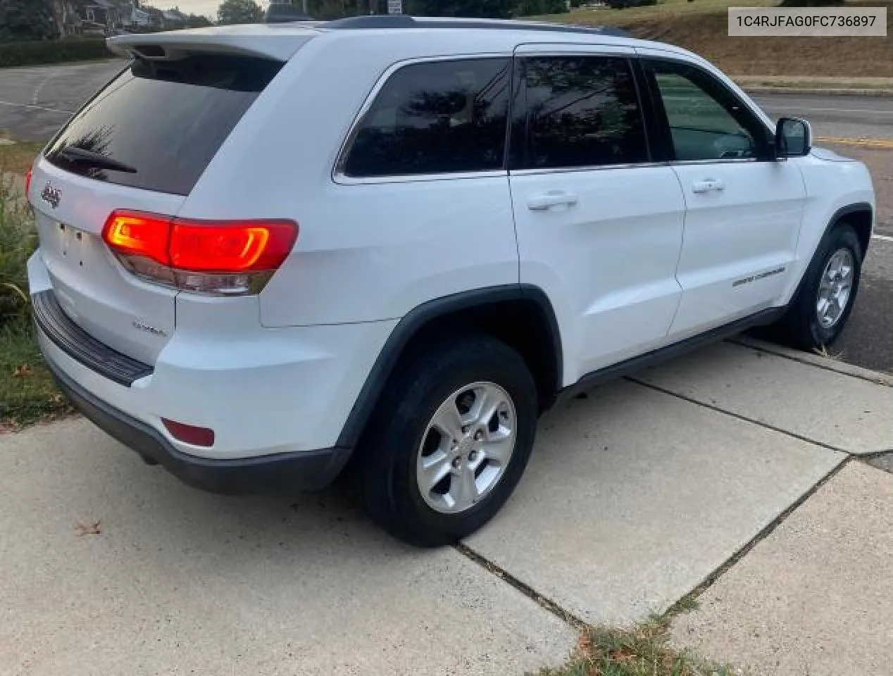 2015 Jeep Grand Cherokee Laredo VIN: 1C4RJFAG0FC736897 Lot: 73062974