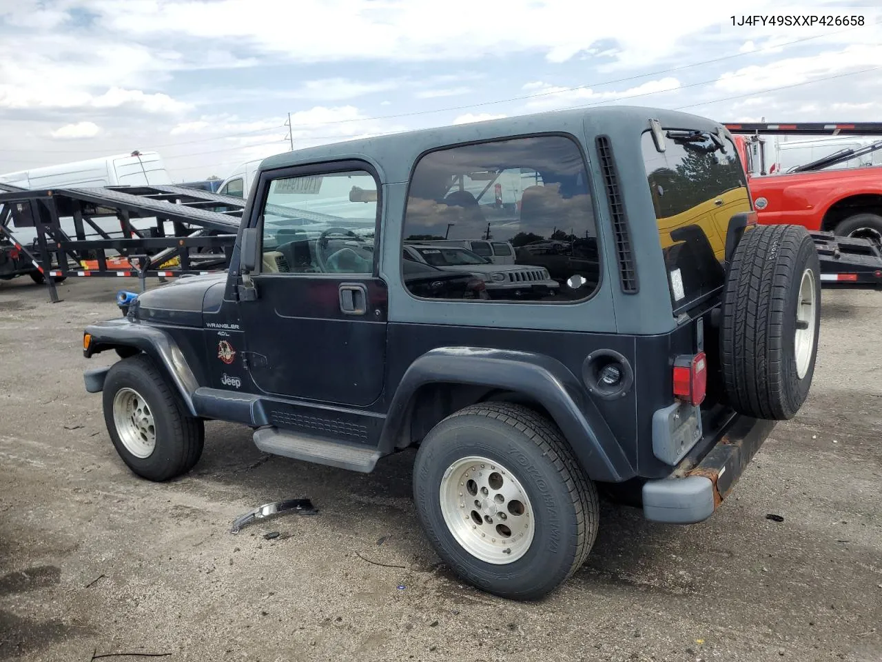 1J4FY49SXXP426658 1999 Jeep Wrangler / Tj Sahara