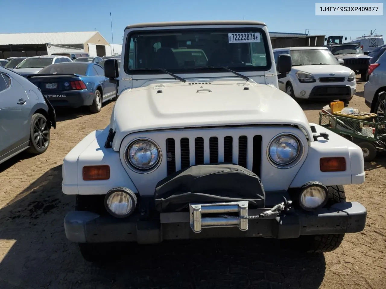 1999 Jeep Wrangler / Tj Sahara VIN: 1J4FY49S3XP409877 Lot: 72223874