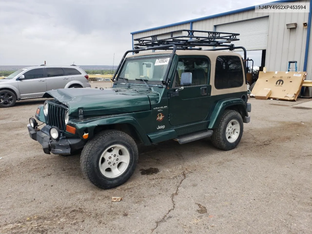 1999 Jeep Wrangler / Tj Sahara VIN: 1J4FY49S2XP453594 Lot: 75287374