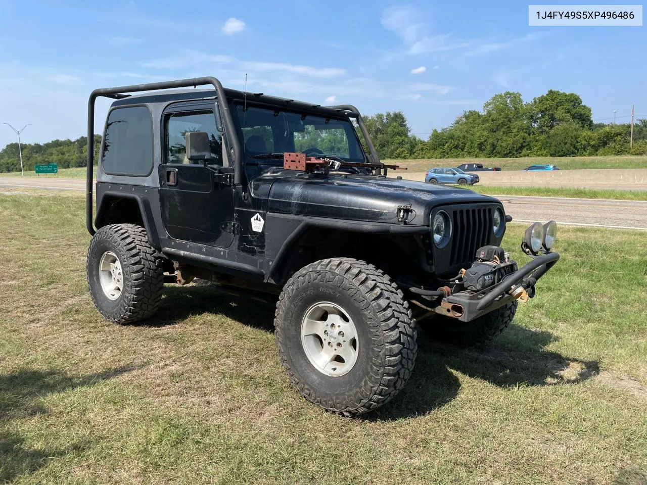 1999 Jeep Wrangler / Tj Sahara VIN: 1J4FY49S5XP496486 Lot: 77263014