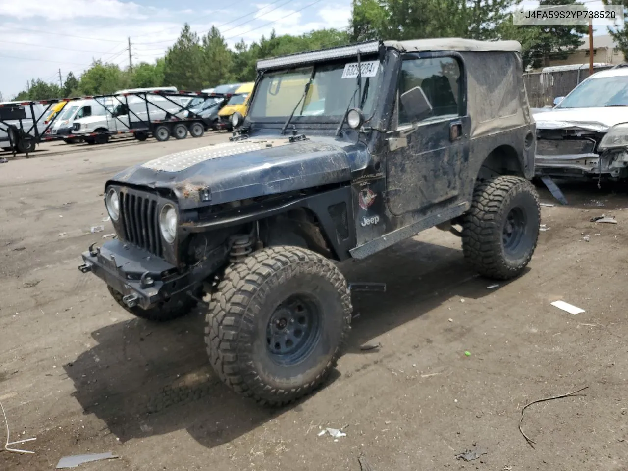 2000 Jeep Wrangler / Tj Sahara VIN: 1J4FA59S2YP738520 Lot: 63292284