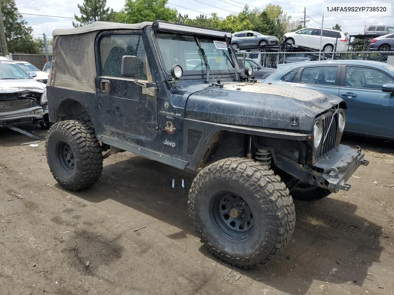 2000 Jeep Wrangler / Tj Sahara VIN: 1J4FA59S2YP738520 Lot: 63292284