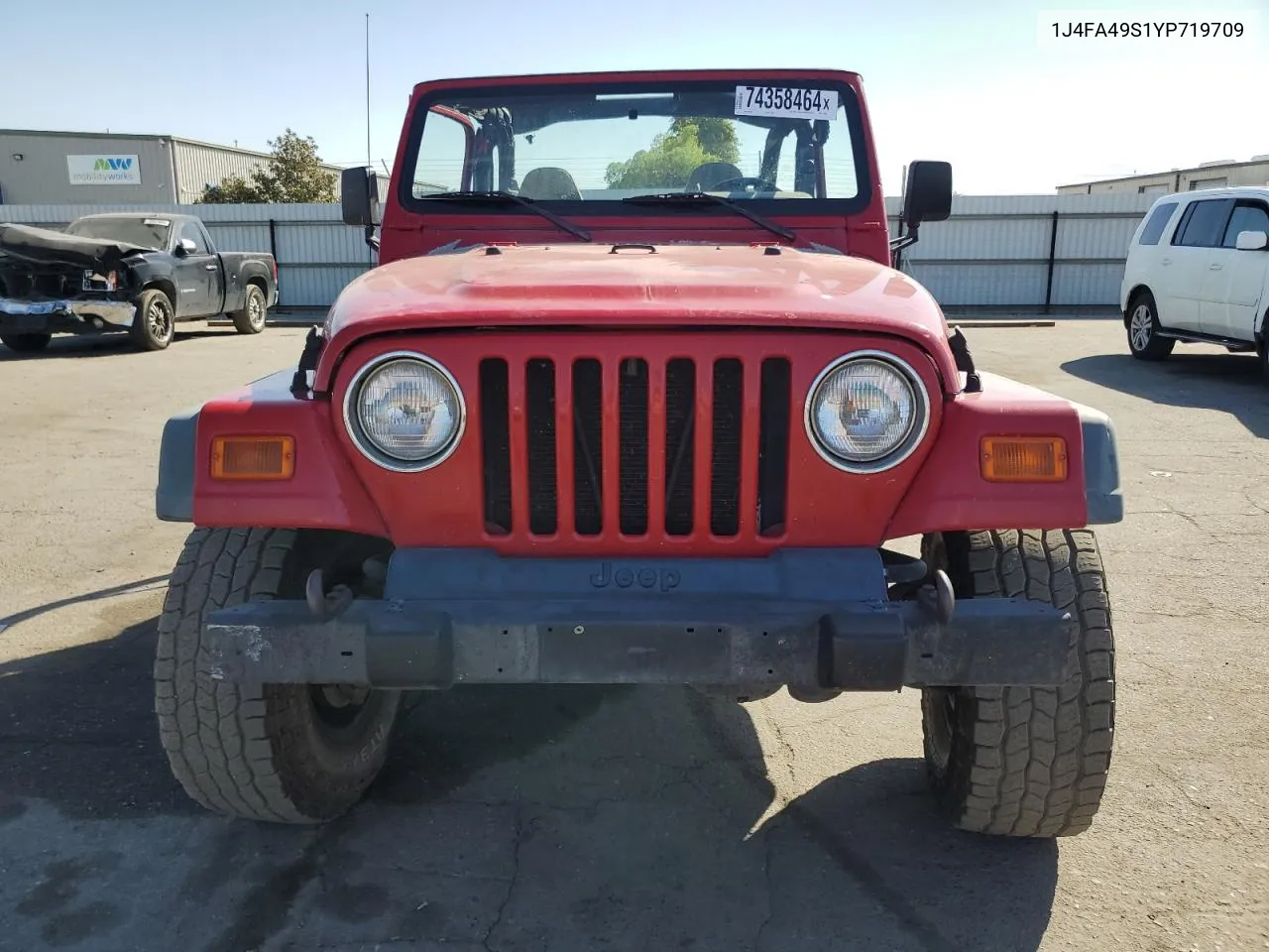 2000 Jeep Wrangler / Tj Sport VIN: 1J4FA49S1YP719709 Lot: 74358464