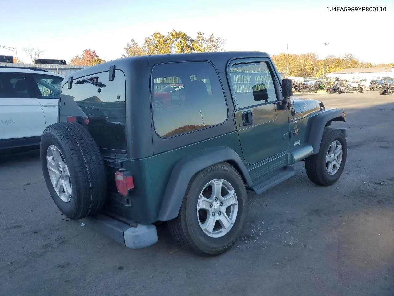 2000 Jeep Wrangler / Tj Sahara VIN: 1J4FA59S9YP800110 Lot: 77593844