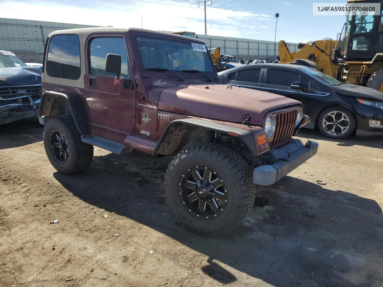 2002 Jeep Wrangler / Tj Sahara VIN: 1J4FA59S12P704608 Lot: 69146504