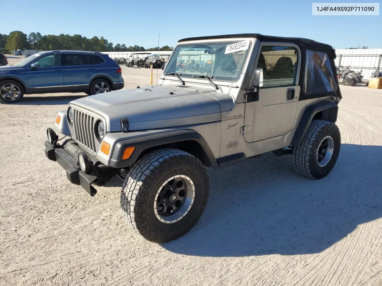 2002 Jeep Wrangler / Tj Sport VIN: 1J4FA49S92P711090 Lot: 76492044