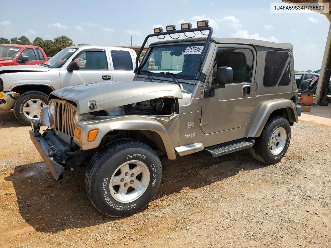 2004 Jeep Wrangler / Tj Sahara VIN: 1J4FA59S34P736690 Lot: 67477694