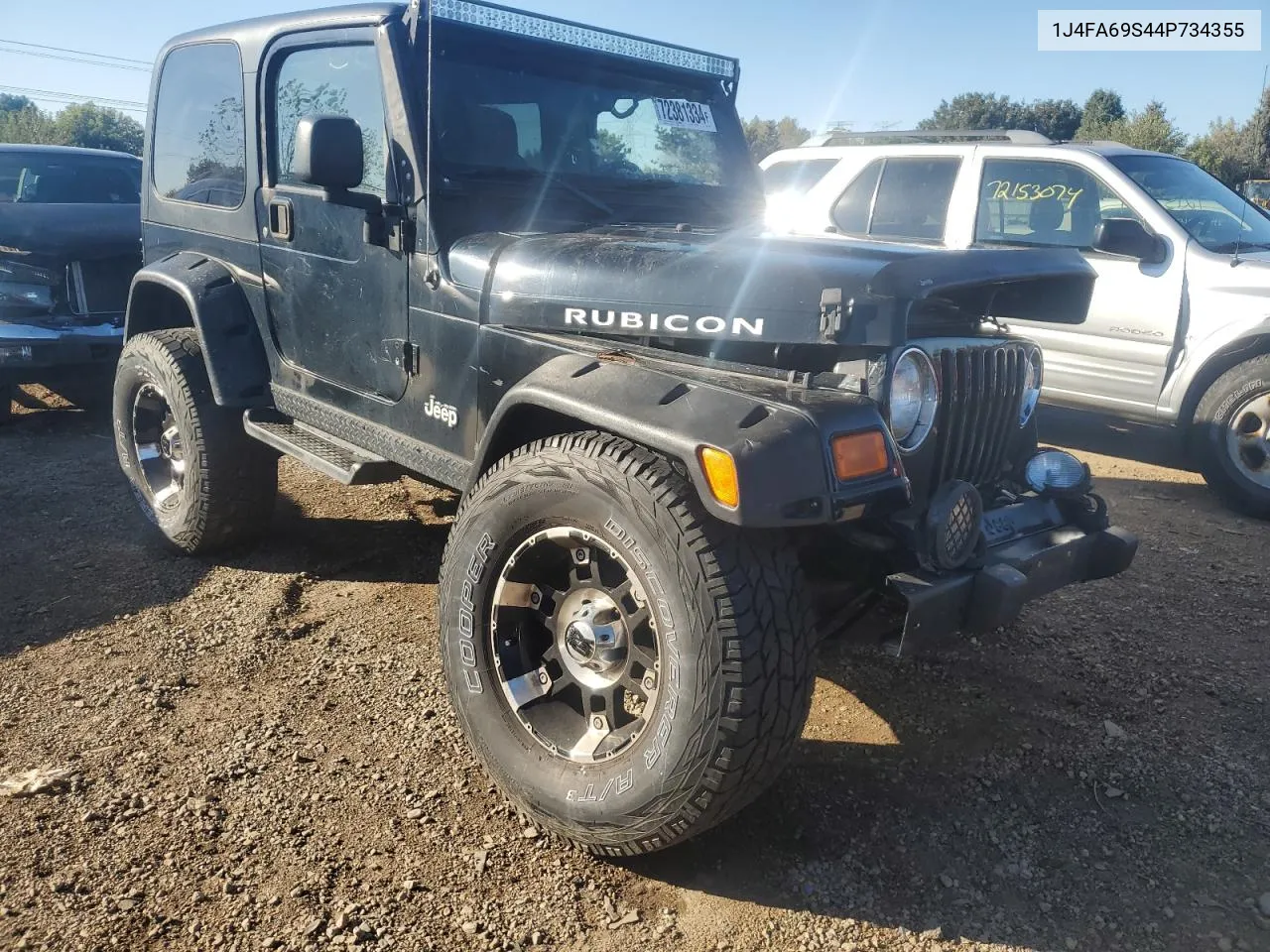 2004 Jeep Wrangler / Tj Rubicon VIN: 1J4FA69S44P734355 Lot: 72381334