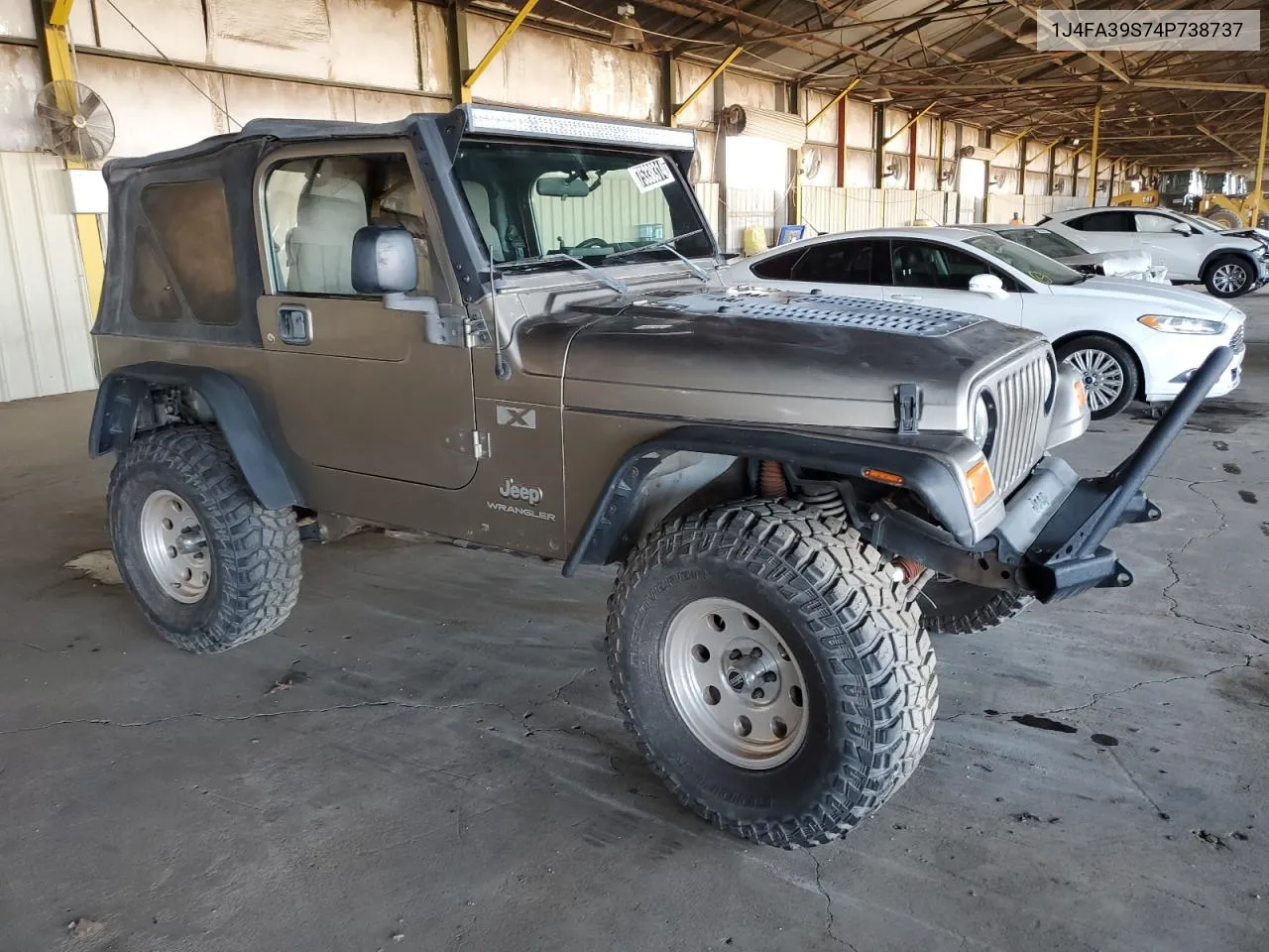 2004 Jeep Wrangler X VIN: 1J4FA39S74P738737 Lot: 75338314