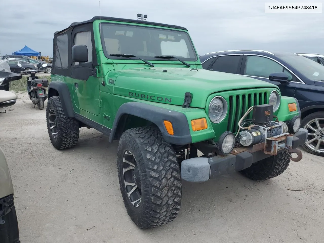 2004 Jeep Wrangler / Tj Rubicon VIN: 1J4FA69S64P748418 Lot: 75909784