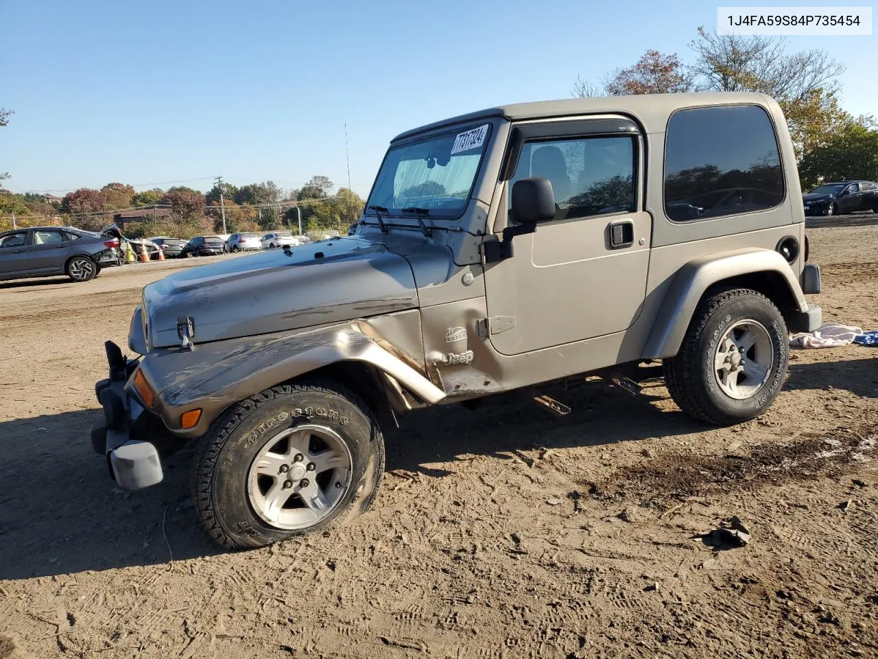 2004 Jeep Wrangler / Tj Sahara VIN: 1J4FA59S84P735454 Lot: 77317324