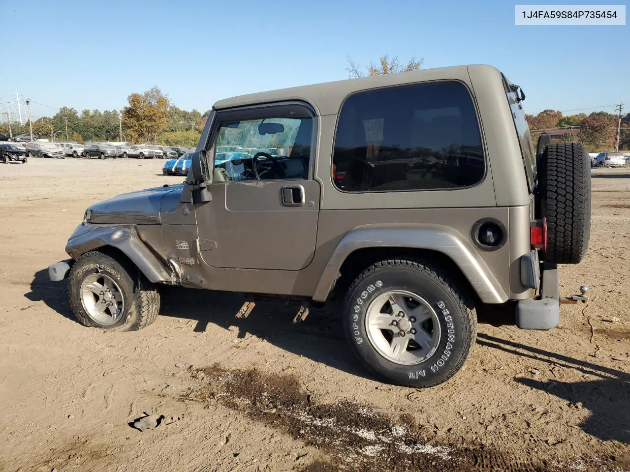 2004 Jeep Wrangler / Tj Sahara VIN: 1J4FA59S84P735454 Lot: 77317324