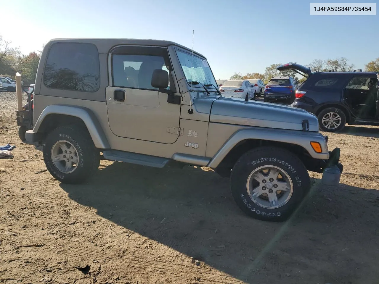 2004 Jeep Wrangler / Tj Sahara VIN: 1J4FA59S84P735454 Lot: 77317324