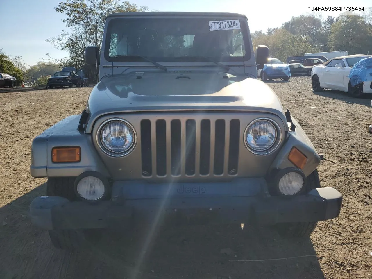 2004 Jeep Wrangler / Tj Sahara VIN: 1J4FA59S84P735454 Lot: 77317324