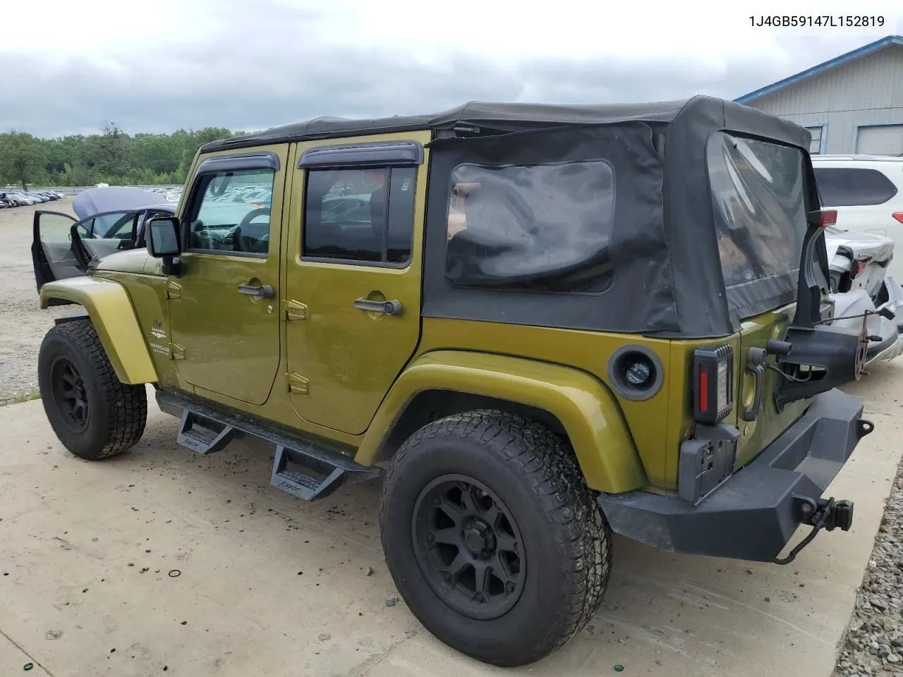 2007 Jeep Wrangler Sahara VIN: 1J4GB59147L152819 Lot: 54698044