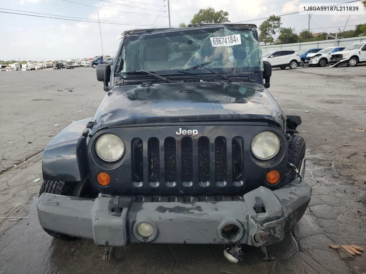 2007 Jeep Wrangler Sahara VIN: 1J8GA59187L211839 Lot: 69674184