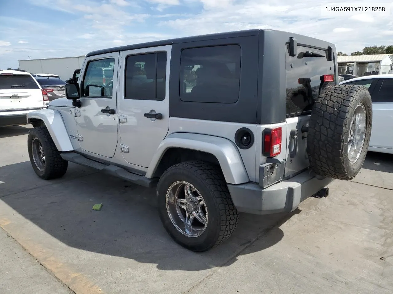 2007 Jeep Wrangler Sahara VIN: 1J4GA591X7L218258 Lot: 71477114