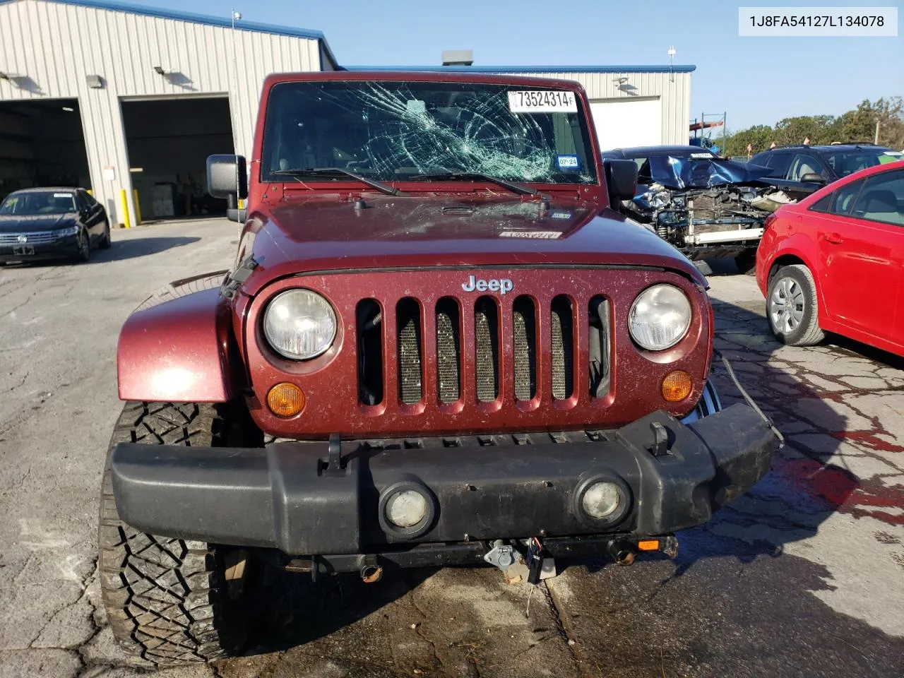 2007 Jeep Wrangler Sahara VIN: 1J8FA54127L134078 Lot: 73524314