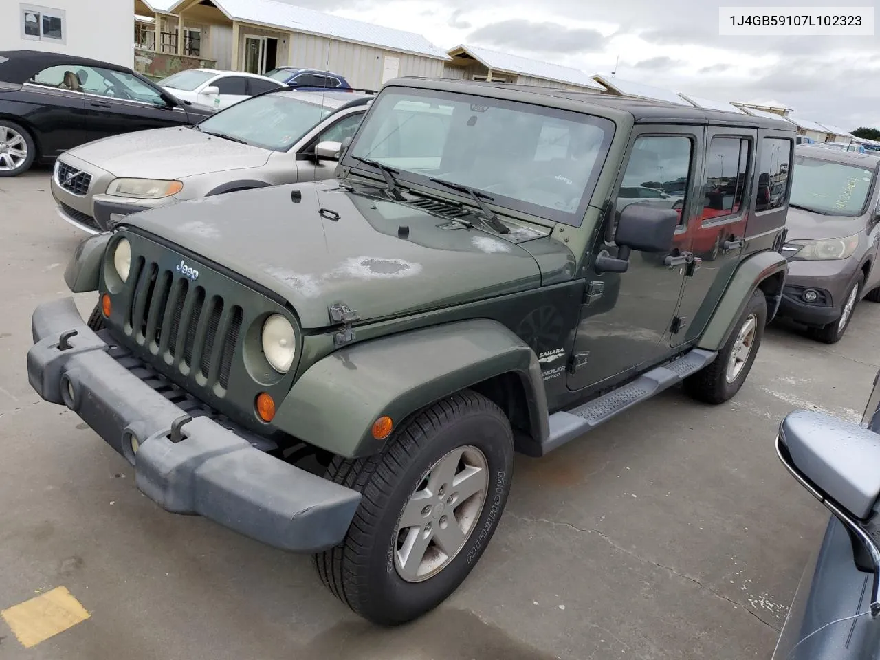 2007 Jeep Wrangler Sahara VIN: 1J4GB59107L102323 Lot: 75009274