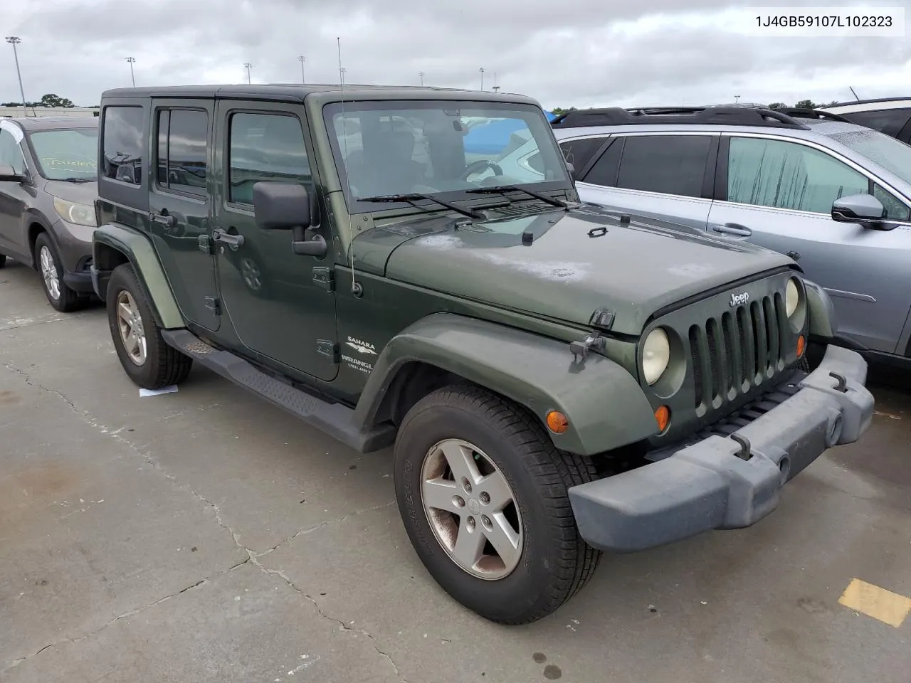 2007 Jeep Wrangler Sahara VIN: 1J4GB59107L102323 Lot: 75009274