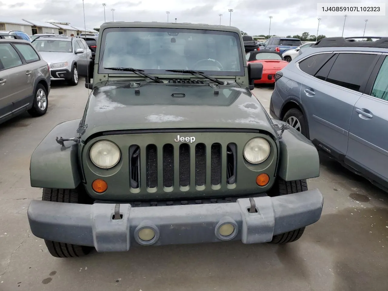 2007 Jeep Wrangler Sahara VIN: 1J4GB59107L102323 Lot: 75009274