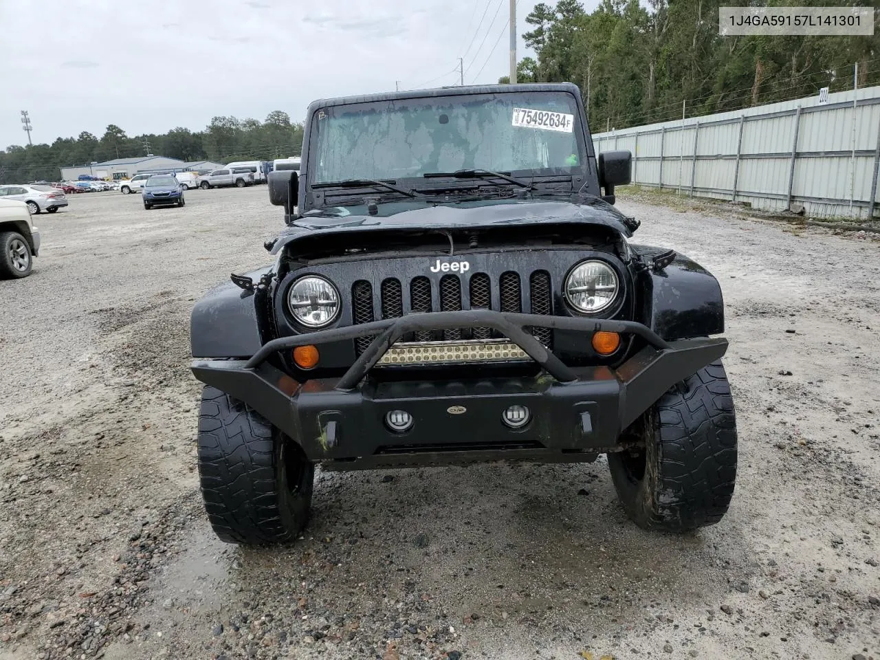 2007 Jeep Wrangler Sahara VIN: 1J4GA59157L141301 Lot: 75492634