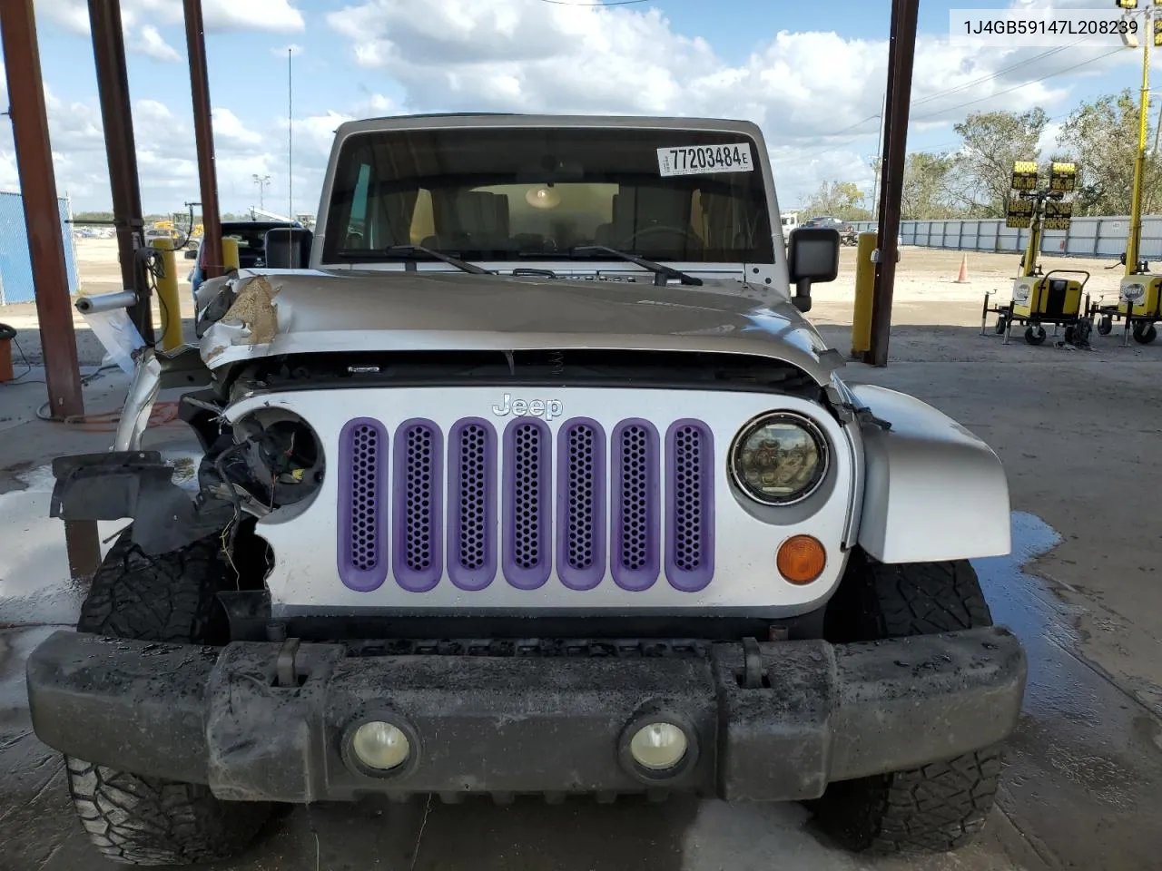 2007 Jeep Wrangler Sahara VIN: 1J4GB59147L208239 Lot: 77203484