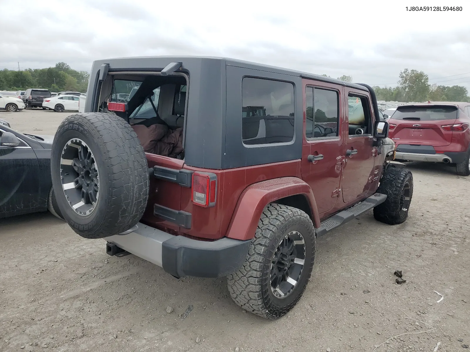 2008 Jeep Wrangler Unlimited Sahara VIN: 1J8GA59128L594680 Lot: 66046944