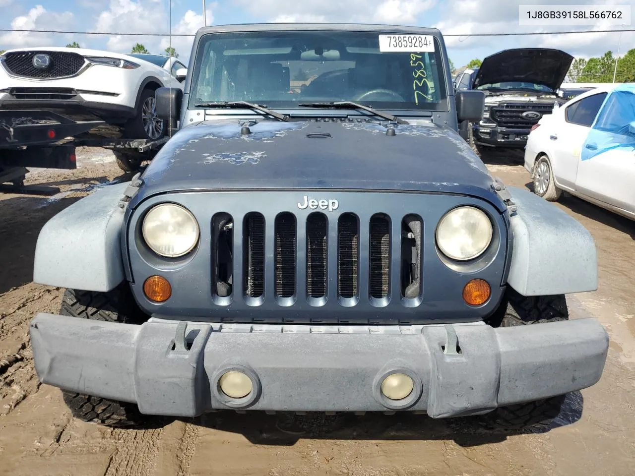 2008 Jeep Wrangler Unlimited X VIN: 1J8GB39158L566762 Lot: 73859284