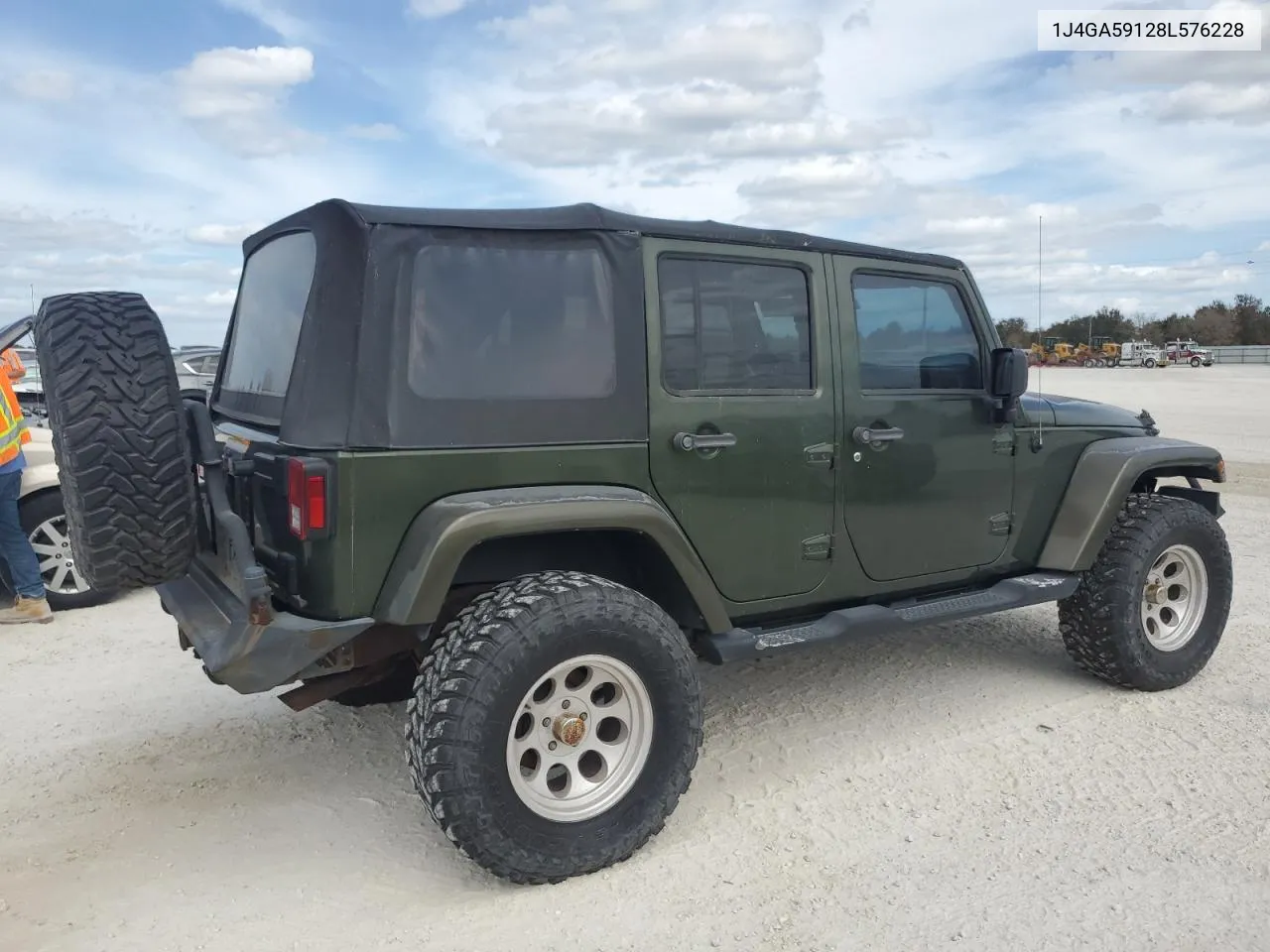 2008 Jeep Wrangler Unlimited Sahara VIN: 1J4GA59128L576228 Lot: 75073074