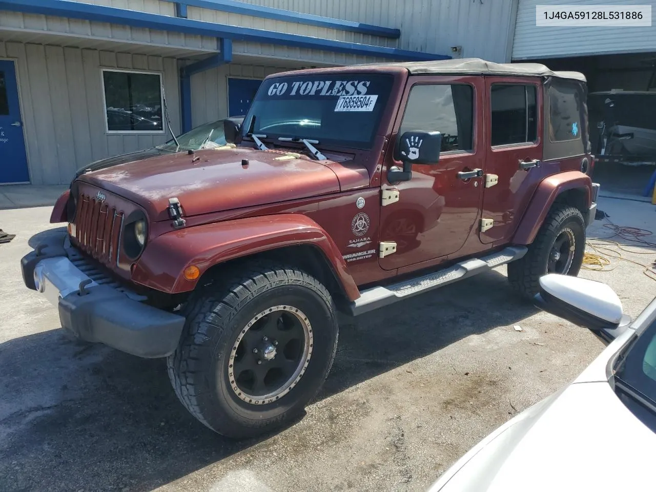 2008 Jeep Wrangler Unlimited Sahara VIN: 1J4GA59128L531886 Lot: 76859504