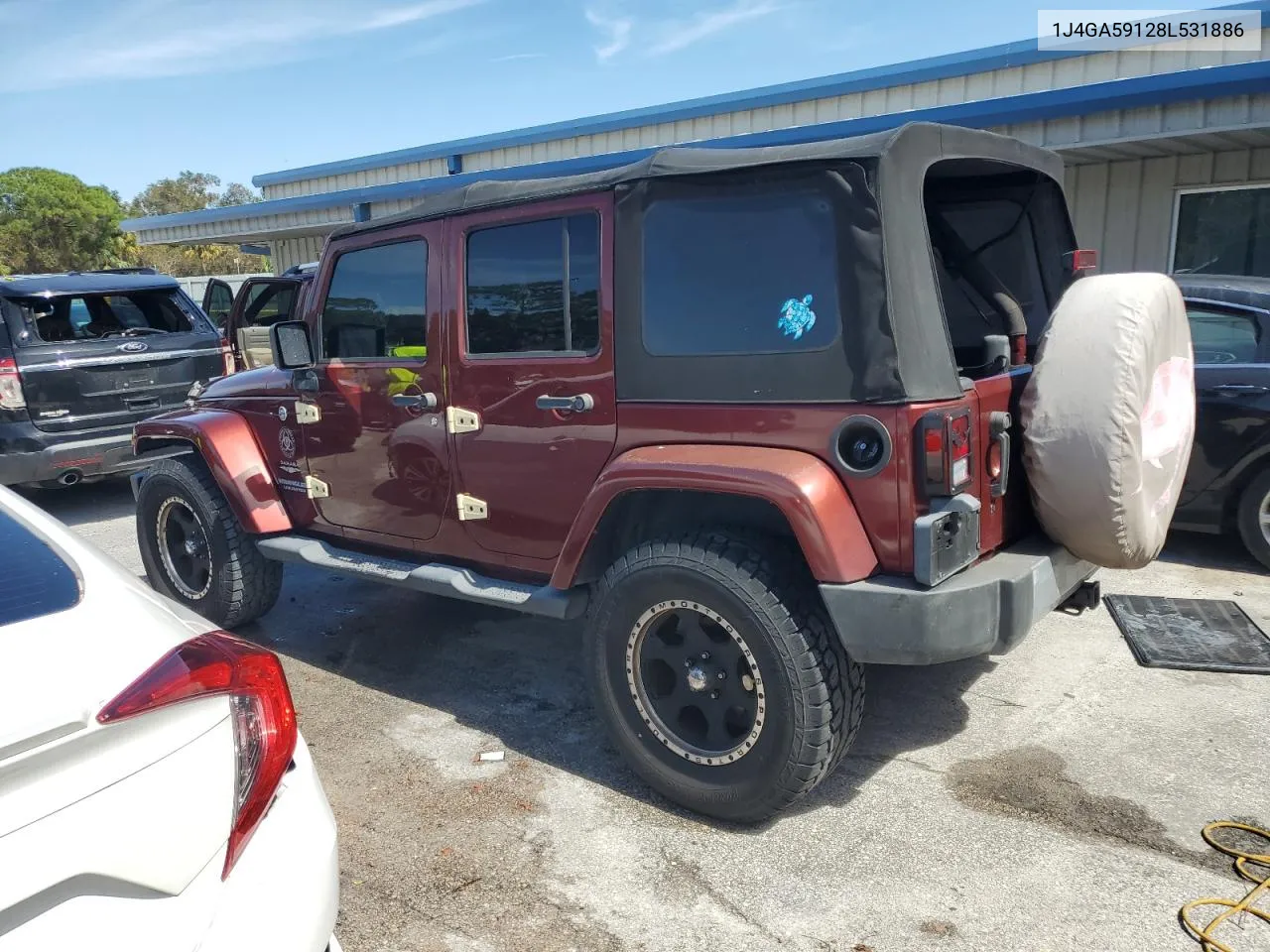 2008 Jeep Wrangler Unlimited Sahara VIN: 1J4GA59128L531886 Lot: 76859504