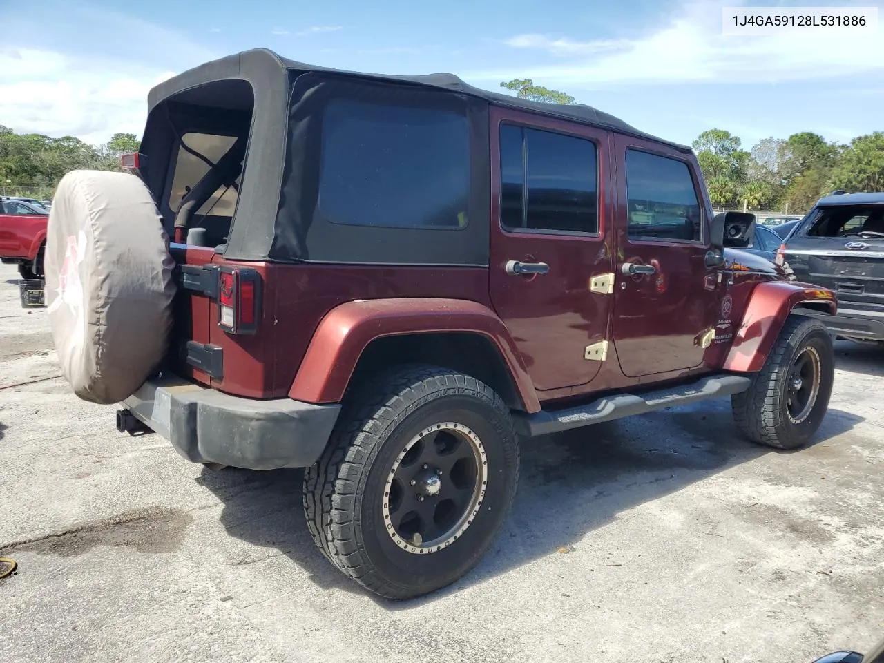 2008 Jeep Wrangler Unlimited Sahara VIN: 1J4GA59128L531886 Lot: 76859504