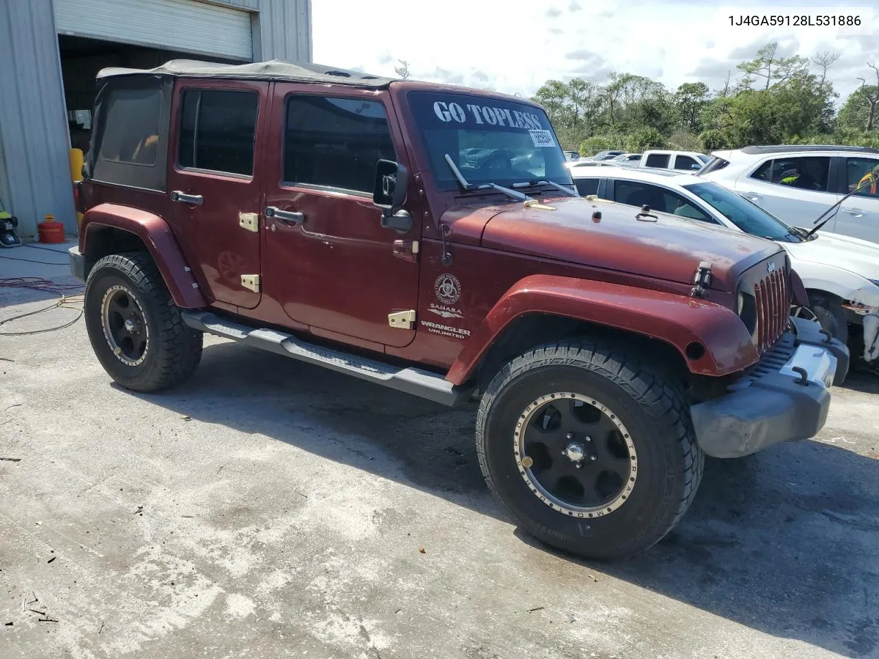 2008 Jeep Wrangler Unlimited Sahara VIN: 1J4GA59128L531886 Lot: 76859504