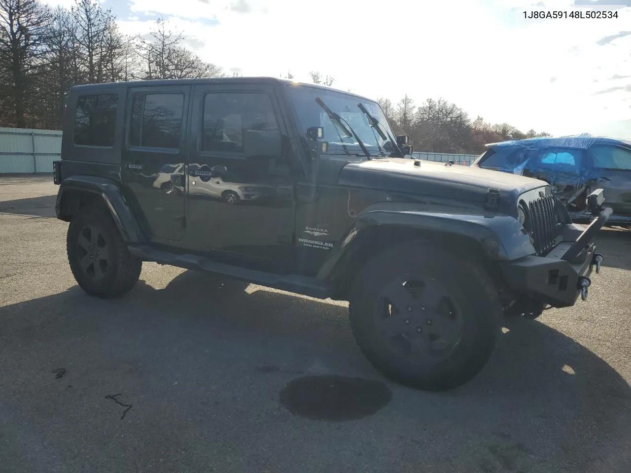 2008 Jeep Wrangler Unlimited Sahara VIN: 1J8GA59148L502534 Lot: 78933974