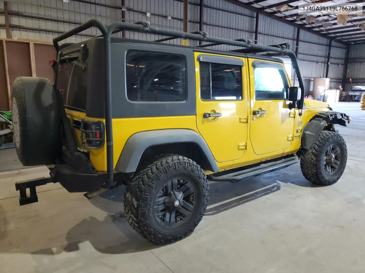 2009 Jeep Wrangler Unlimited X VIN: 1J4GA39119L766768 Lot: 37922194