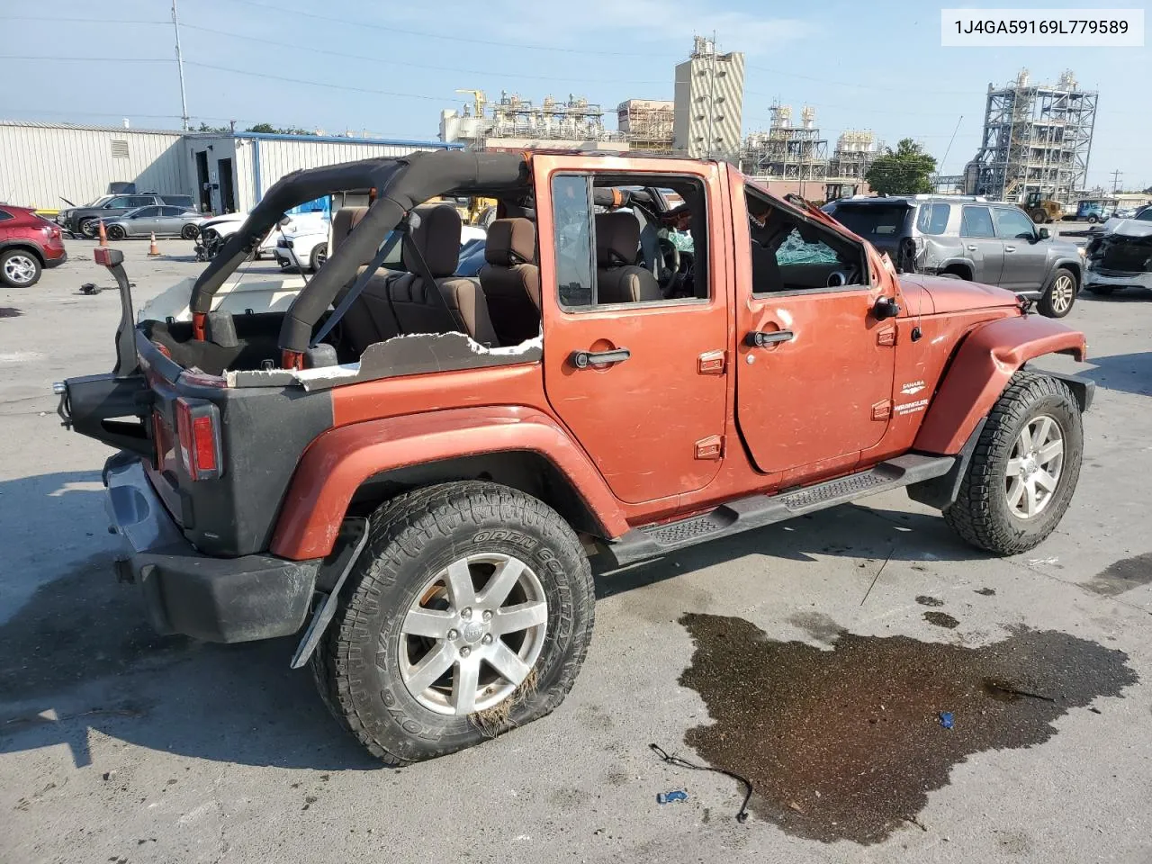 2009 Jeep Wrangler Unlimited Sahara VIN: 1J4GA59169L779589 Lot: 67850544