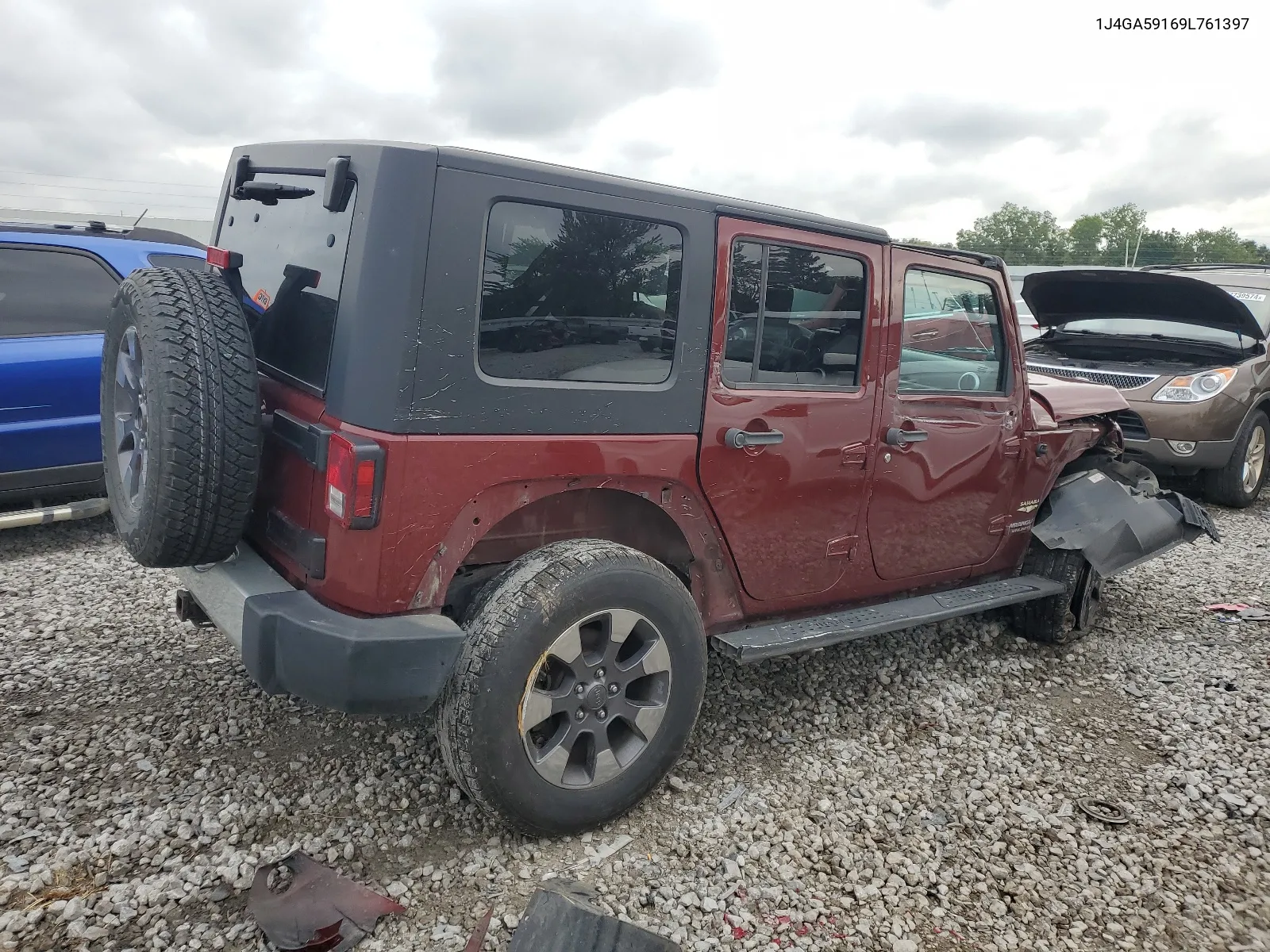 2009 Jeep Wrangler Unlimited Sahara VIN: 1J4GA59169L761397 Lot: 68013974