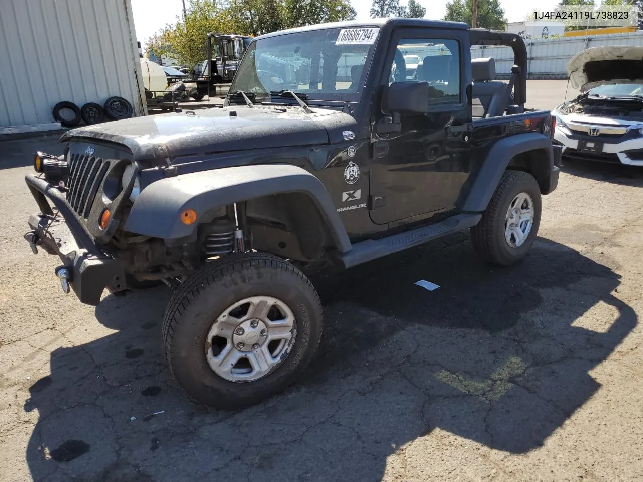 2009 Jeep Wrangler X VIN: 1J4FA24119L738823 Lot: 68686794