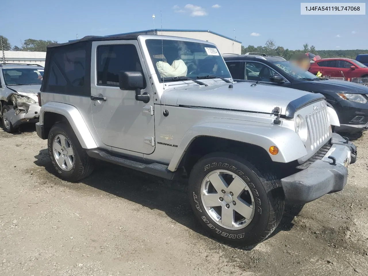 2009 Jeep Wrangler Sahara VIN: 1J4FA54119L747068 Lot: 71209904