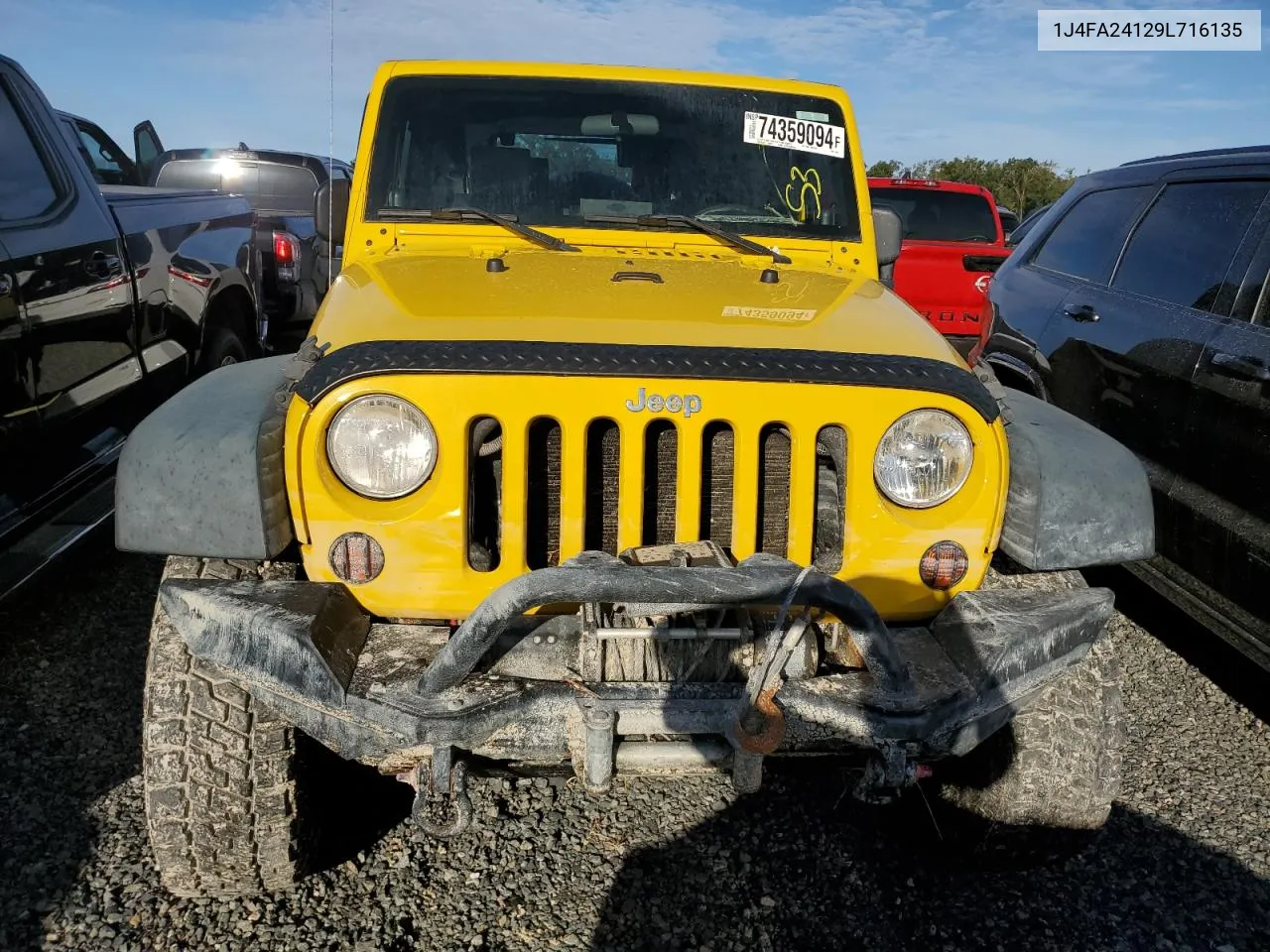 2009 Jeep Wrangler X VIN: 1J4FA24129L716135 Lot: 74359094