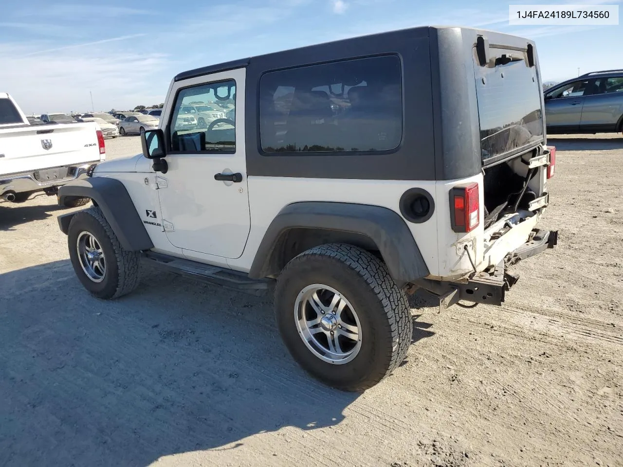 2009 Jeep Wrangler X VIN: 1J4FA24189L734560 Lot: 74882354