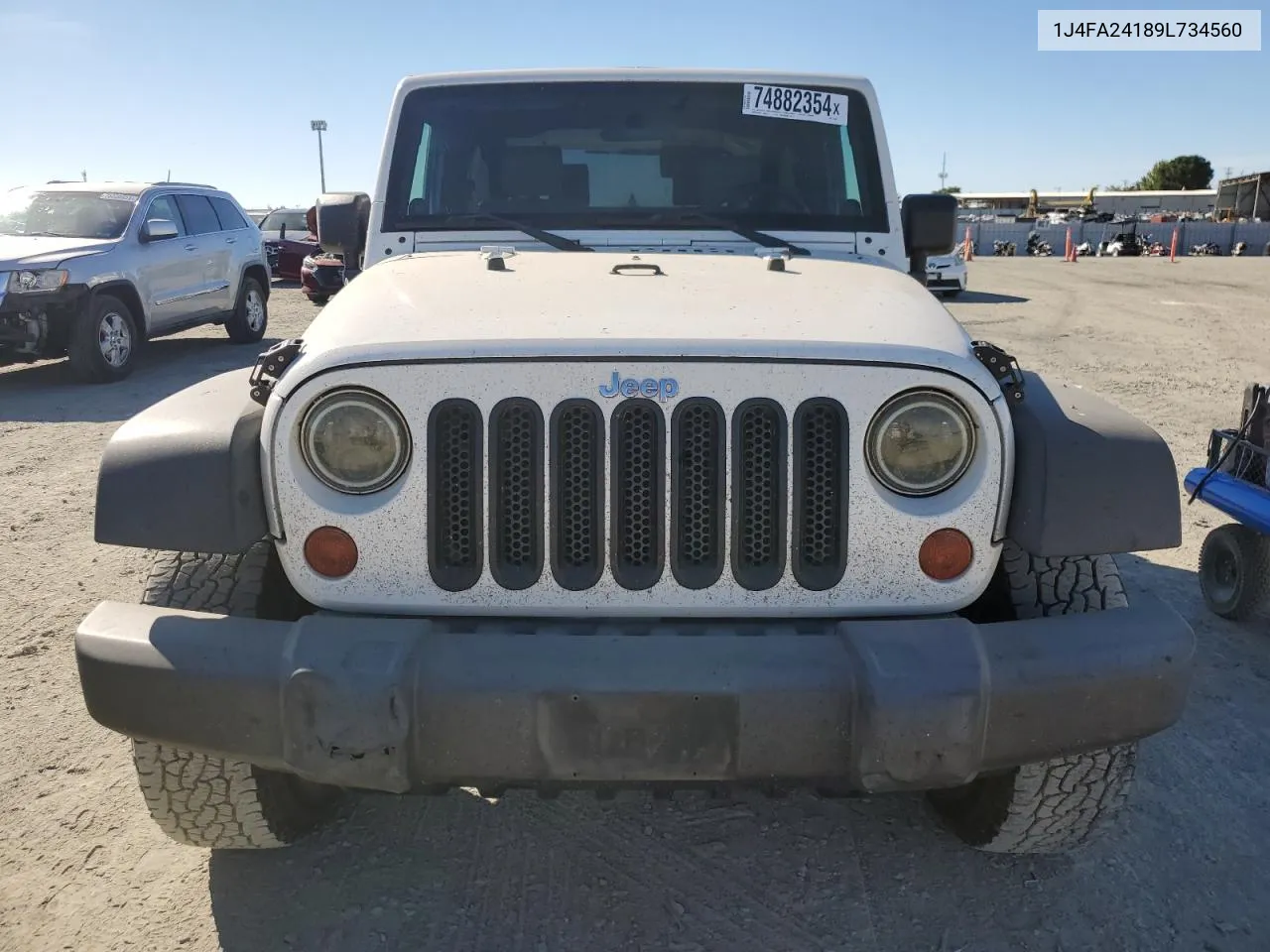 2009 Jeep Wrangler X VIN: 1J4FA24189L734560 Lot: 74882354