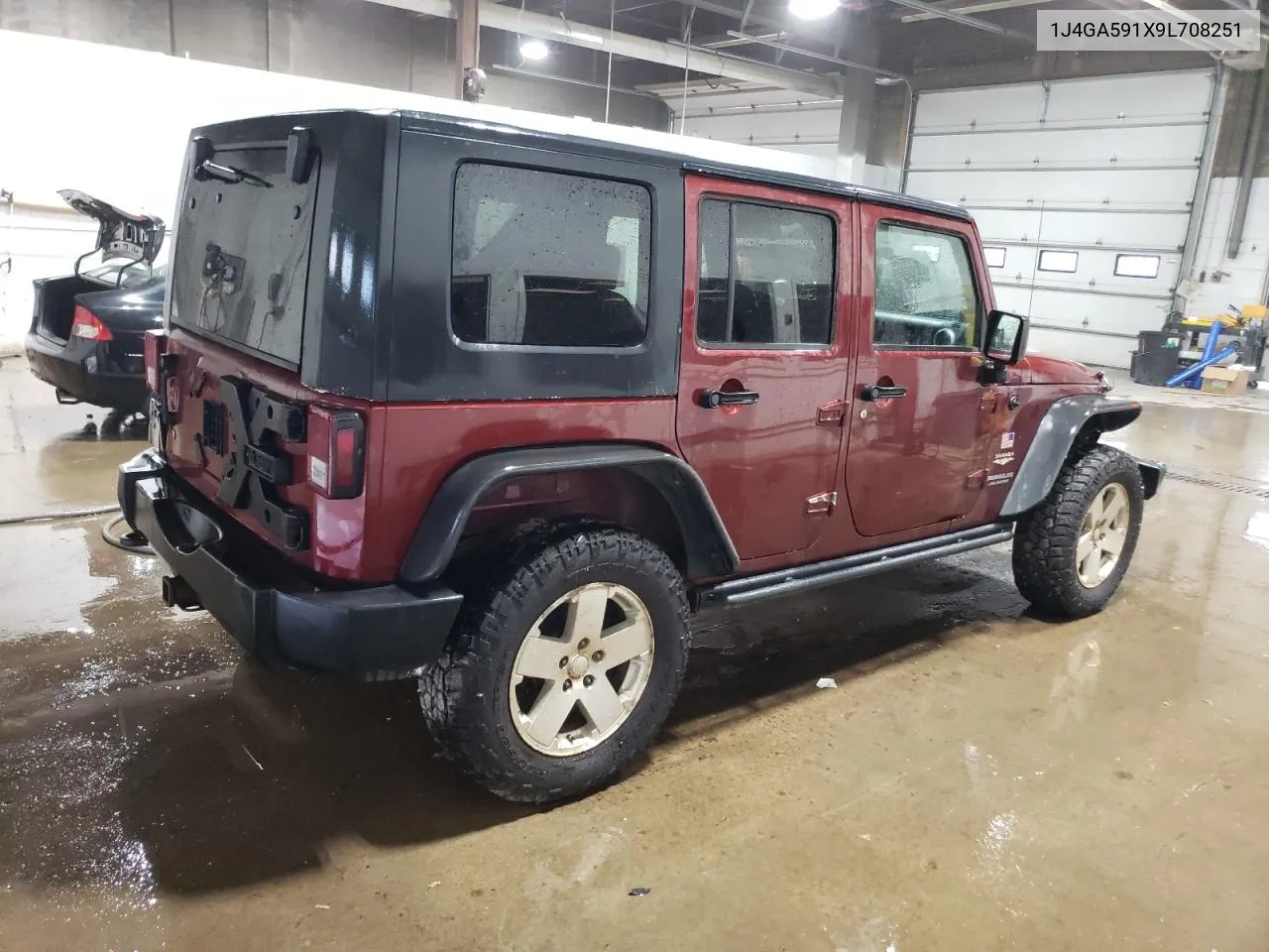 2009 Jeep Wrangler Unlimited Sahara VIN: 1J4GA591X9L708251 Lot: 75187724