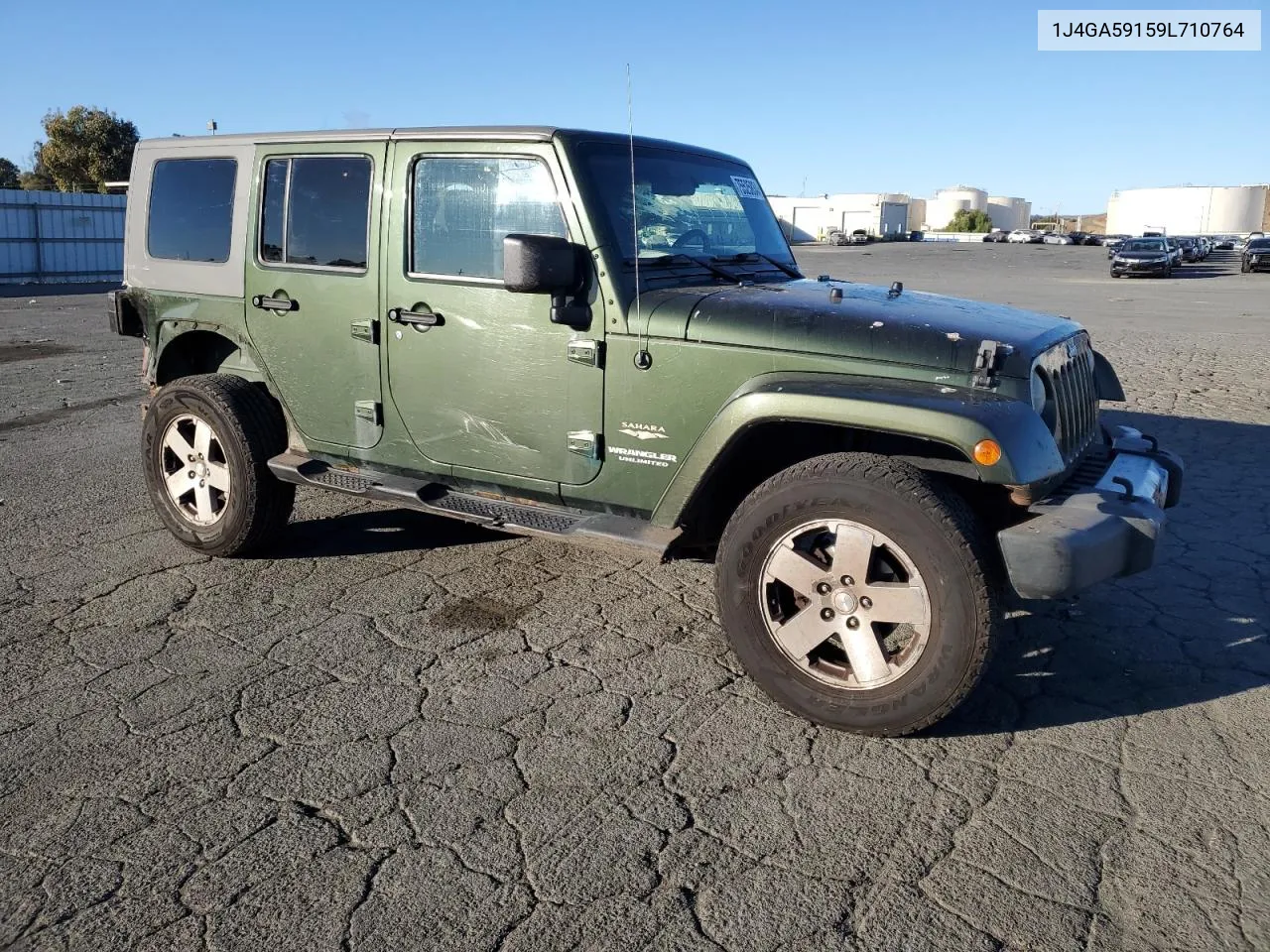 2009 Jeep Wrangler Unlimited Sahara VIN: 1J4GA59159L710764 Lot: 75525834