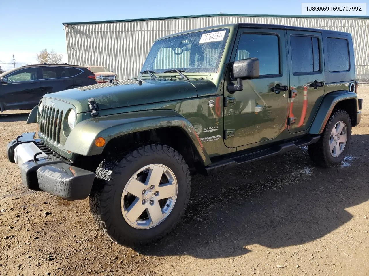 2009 Jeep Wrangler Unlimited Sahara VIN: 1J8GA59159L707992 Lot: 75764284