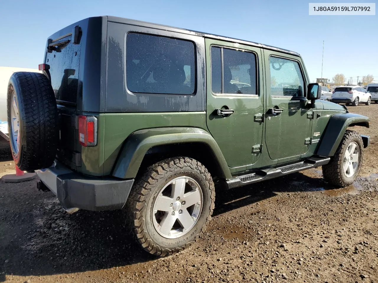 2009 Jeep Wrangler Unlimited Sahara VIN: 1J8GA59159L707992 Lot: 75764284